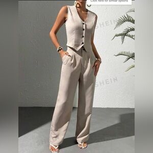 Raffinea solid bottom, front vest blaze, wide leg pants.